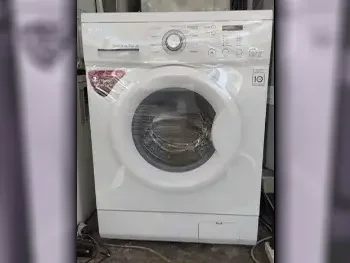 LG / Front Load Washer / 7 Kg White For Sale in Qatar