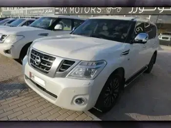 Nissan Patrol Platinum White 2015 For Sale in Qatar