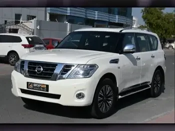 Nissan Patrol Platinum White 2015 For Sale in Qatar