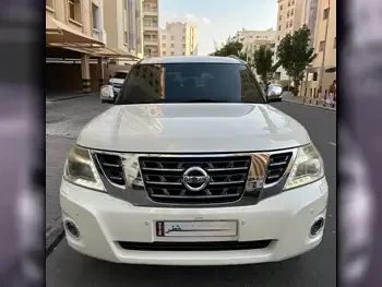 Nissan Patrol Platinum White 2015 For Sale in Qatar