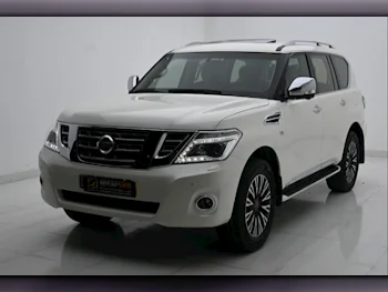 Nissan Patrol Platinum White 2015 For Sale in Qatar