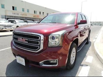 GMC Yukon XL Maroon 2017 For Sale in Qatar